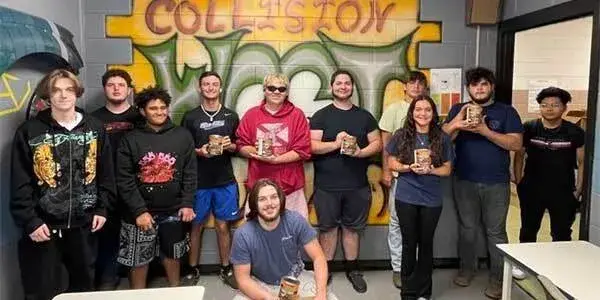 Evercoat Partners with ASE posing in picture